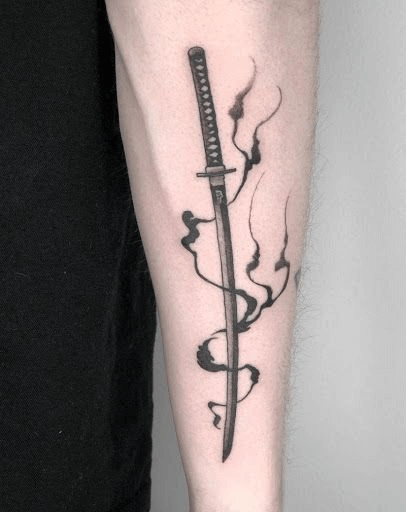 Demon slayer behind arm tattoo